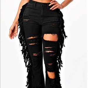 HIGH RISE FLARE DISTRESSED SIDE TASSEL JEANS